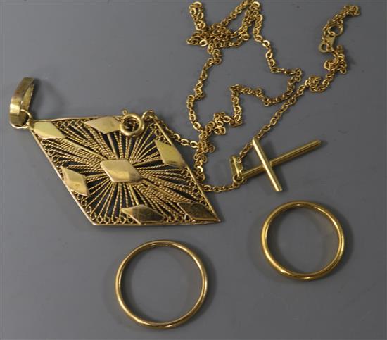 Two 22ct gold wedding bands, and 18ct gold cross pendant and yellow metal diamond shaped pendant and a gilt metal chain.